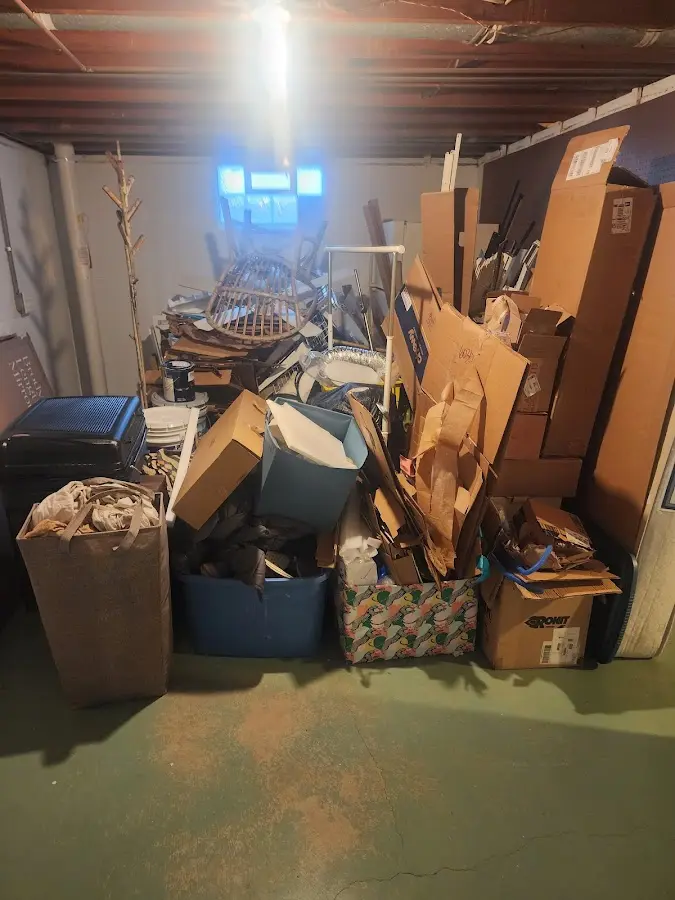 Roll-off dumpster container at job site for 2 Yard Dumpster Rental in East Hartford